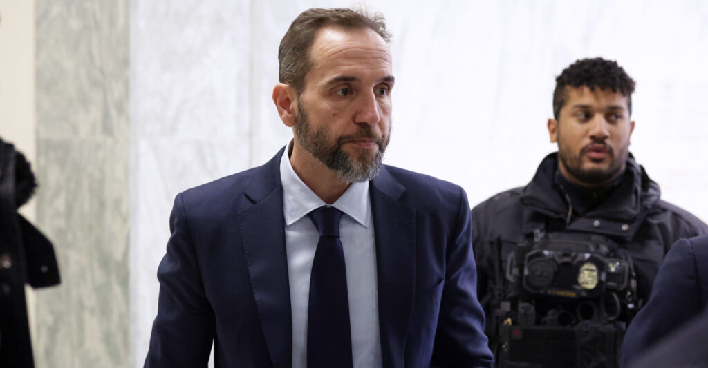WASHINGTON, DC - DECEMBER 17: Former Special Counsel Jack Smith (C) arrives to testify during a closed-door deposition before the House Judiciary Committee in the Rayburn House Office Building on Capitol Hill on December 17, 2025 in Washington, DC. Smith was appointed independent special counsel by Attorney General Merrick Garland in 2022 to oversee two criminal investigations into former President Donald Trump's role in the January 6, 2021 attack on the U.S. Capitol and mishandling of classified documents. Both cases were eventually dismissed and Trump went on to win his second presidential election in 2024. (Photo by Alex Wong/Getty Images)