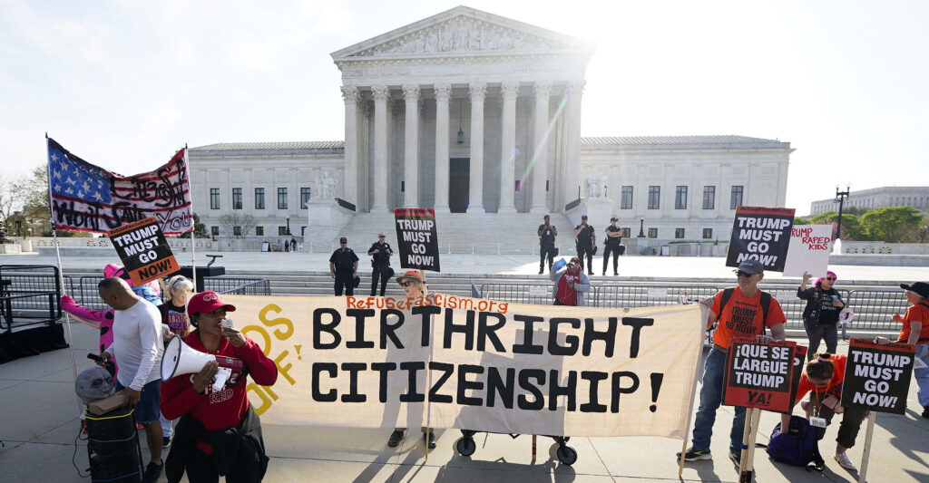 WASHINGTON, DC - APRIL 01: People demonstrate outside the U.S. Supreme Court ahead of U.S. President Donald Trump's expected arrival on April 01, 2026 in Washington, DC. The Supreme Court is hearing oral arguments in Trump v. Barbara to determine if President Trump's executive order ending birthright citizenship is constitutional. According to historians and the Court, this is the first time a sitting president has attended oral arguments at the nation's highest court. (Photo by Al Drago/Getty Images)