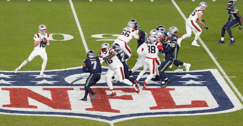 SANTA CLARA, CALIFORNIA - FEBRUARY 08: Drake Maye #10 of the New England Patriots drops back to pass against the Seattle Seahawks during the fourth quarter in Super Bowl LX at Levi's Stadium on February 08, 2026 in Santa Clara, California. (Photo by Thearon W. Henderson/Getty Images)