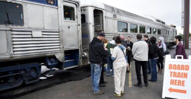 People boarding a train