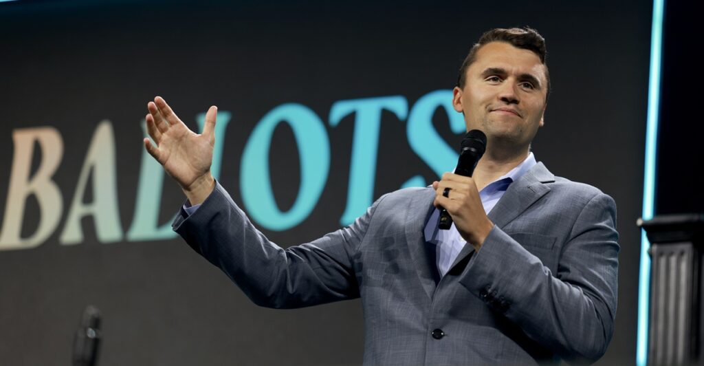 Charlie Kirk speaking with a microphone