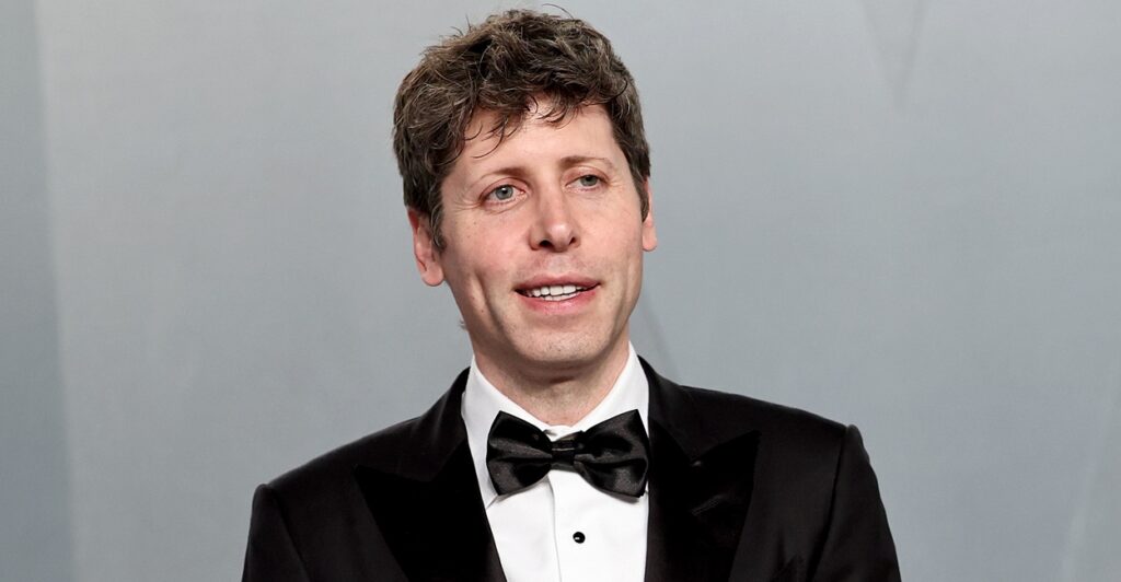 Sam Altman smiling while wearing a tuxedo.