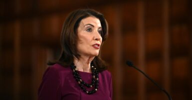 N.Y. Gov. Kathy Hochul speaking at a microphone