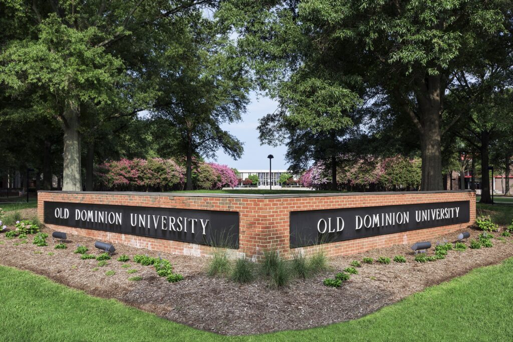A low brick wall with two sides reading "Old Dominion University."