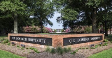A low brick wall with two sides reading "Old Dominion University."