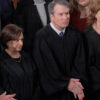 WASHINGTON, DC - FEBRUARY 24: U.S. Supreme Court Chief Justice John Roberts and Associate Justices Elena Kagan, Brett Kavanaugh and Amy Coney Barrett applaud at the conclusion of President Donald Trump's State of the Union address during a joint session of Congress at the Capitol on February 24, 2026, in Washington, DC. Trump delivered his address days after the Supreme Court struck down the administration's tariff strategy and amid a U.S. military buildup in the Persian Gulf threatening Iran. (Photo by Chip Somodevilla/Getty Images)