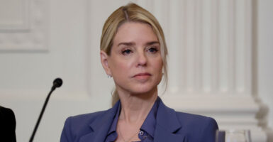 Pam Bondi sits in the White House.