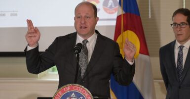 DENVER, CO - AUGUST 28 : Gov. Jared Polis, left, and Director of the Office of State Planning and Budget Mark Ferrandino answer questions from media. Gov. Polis signed bills from special legislative session and took action to close hole in budget created by congressional republicans and president Donald Trump at Governor's Residence and Boettcher Mansion in Denver, Colorado on Thursday, August 28, 2025. (Photo by Hyoung Chang/The Denver Post)