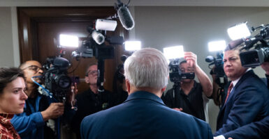 Chairman Sen. Lindsey Graham, R-S.C., speaks to the cameras as he arrives to a hearing.